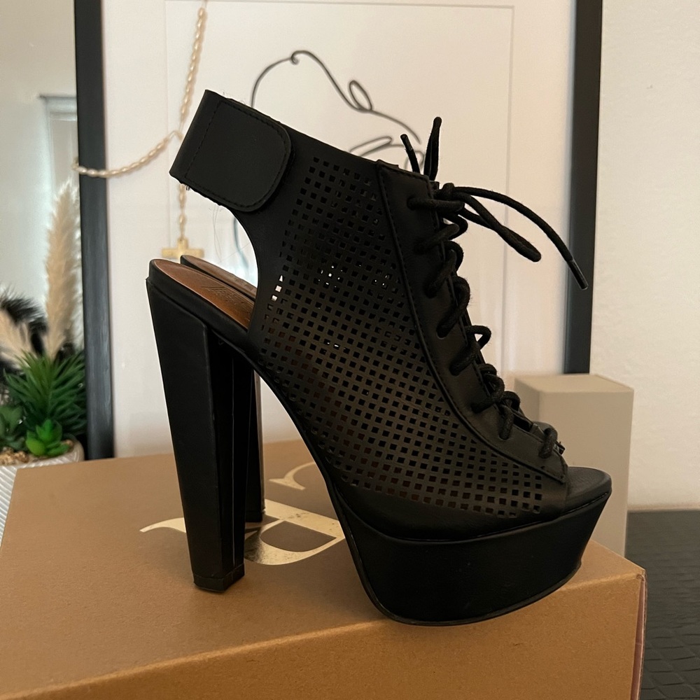 Size 7 lace up heels with Velcro fasteners